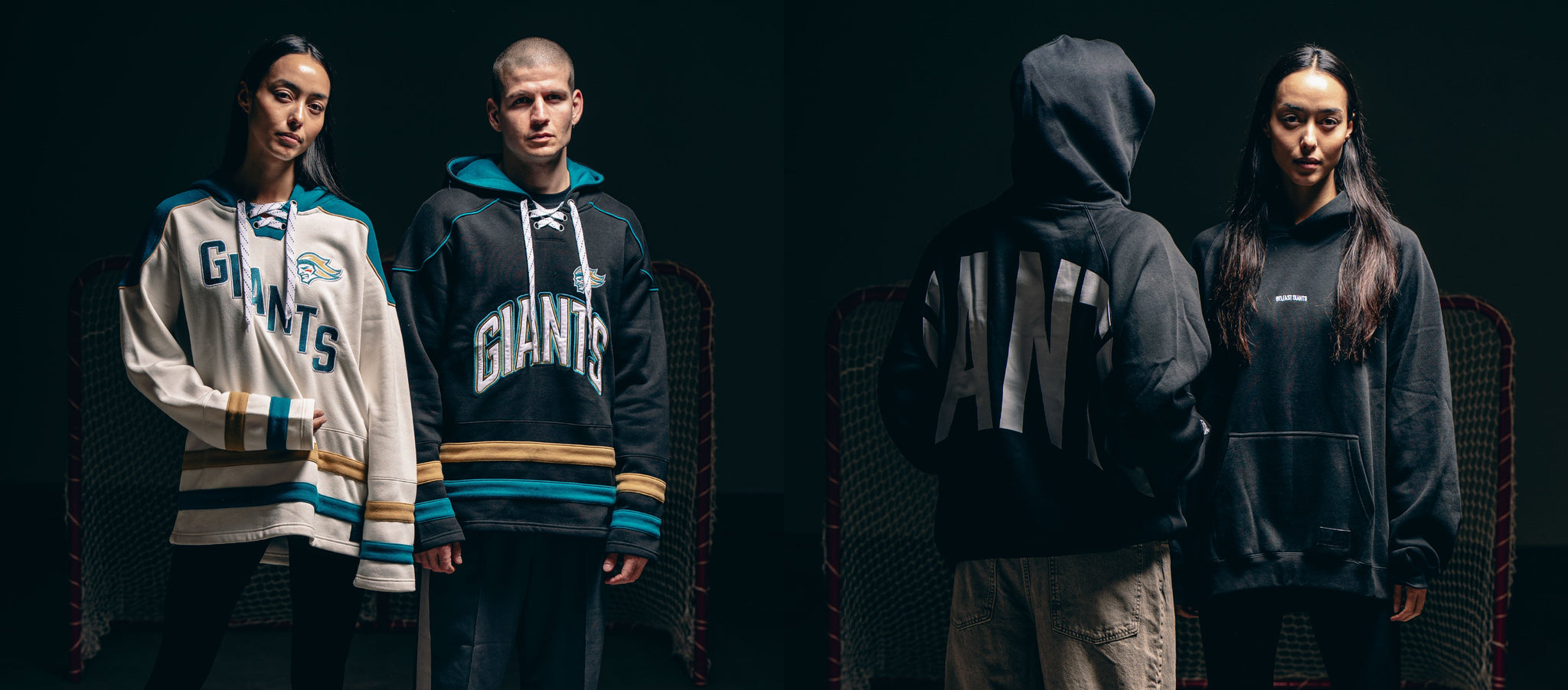 Two models pose in hockey jerseys and hoodies with “Giants” and “ANTI” text, standing in front of hockey nets against a dark background.