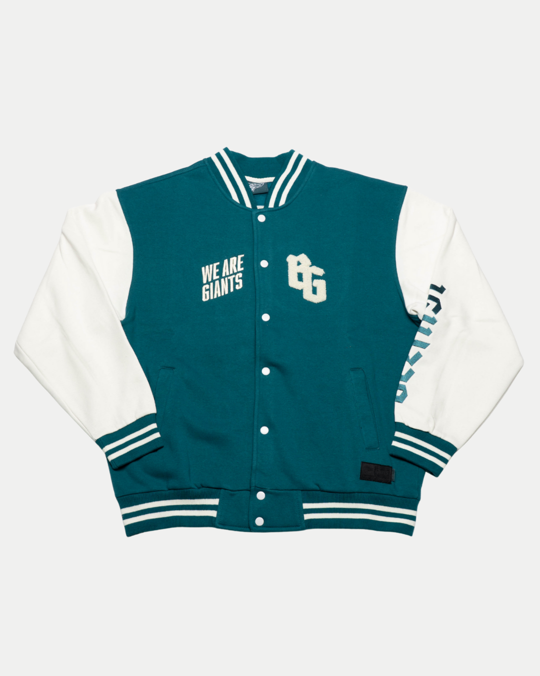 The Belfast Giants Varsity Jacket Teal features white sleeves, striped cuffs and collar, white snap buttons, "WE ARE GIANTS" and GG chest text, plus "GIANTS" on the right sleeve for a classic collegiate vibe. Brand: Belfast Giants.