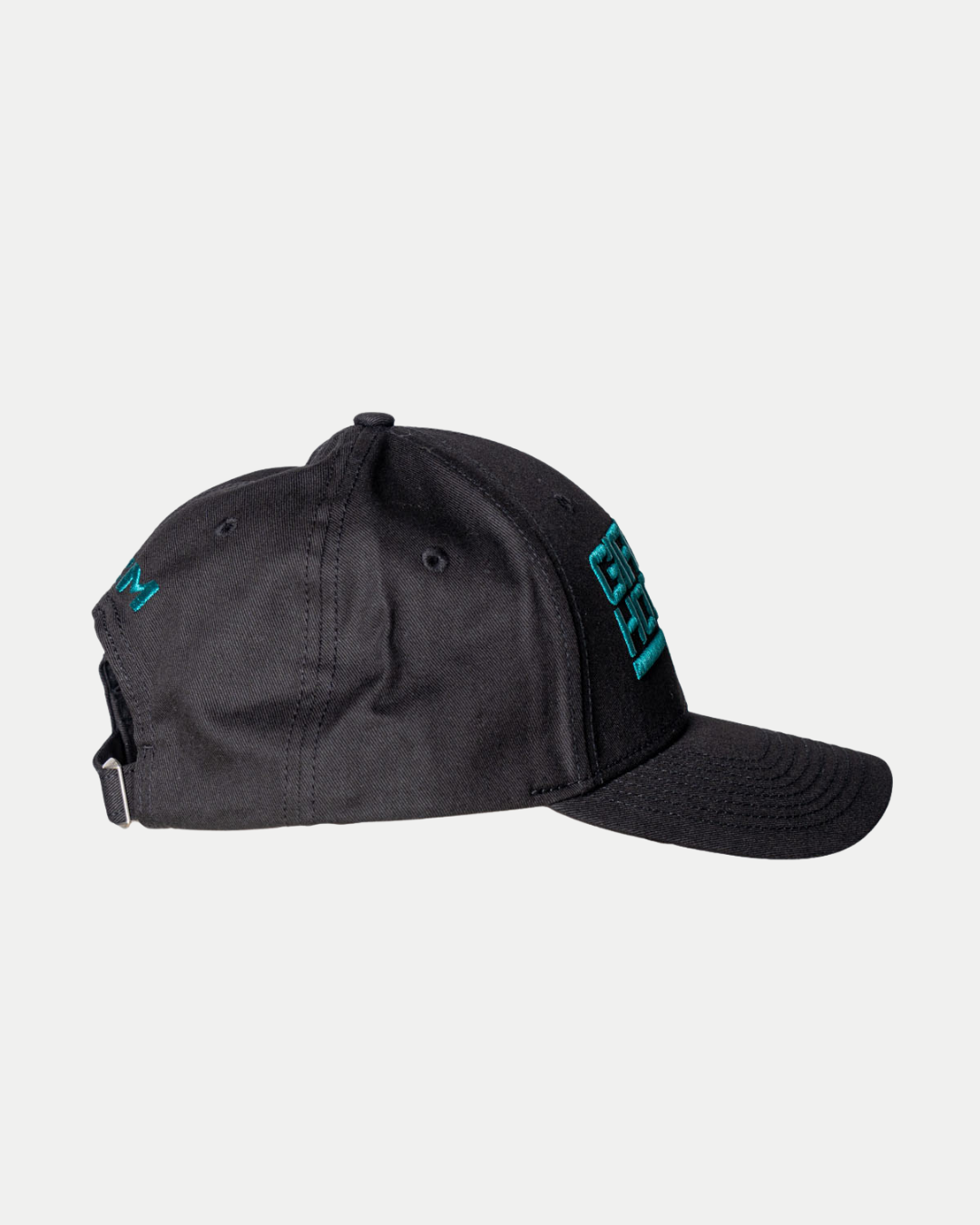 The 25-26 CCM Black Cap Teal Logo from Belfast Giants Store by National Merchandise is shown from the left side on a plain light gray background. It features teal embroidery on the front and side, plus an adjustable strap at the back.