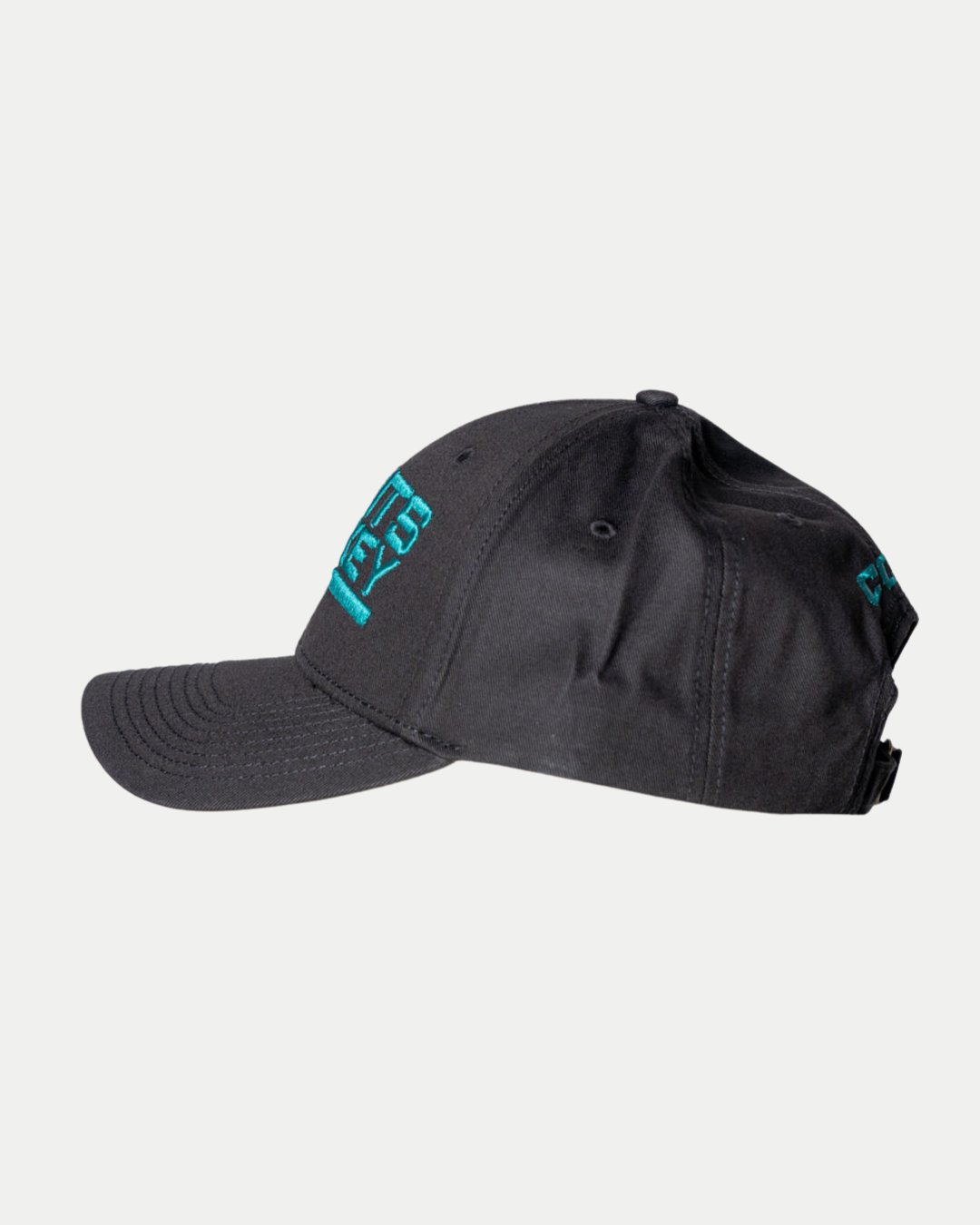 The 25-26 CCM Black Cap Teal Logo from Belfast Giants Store features teal embroidered text on the front and side, a curved brim, and an adjustable strap at the back.