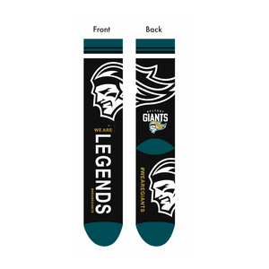 Belfast Giants Socks Black: These black socks feature a stylized helmeted figure in black, white, and teal, “WE ARE LEGENDS” on the front, and the Belfast Giants logo with #WEAREGIANTS in yellow on the back. Brand: Belfast Giants.