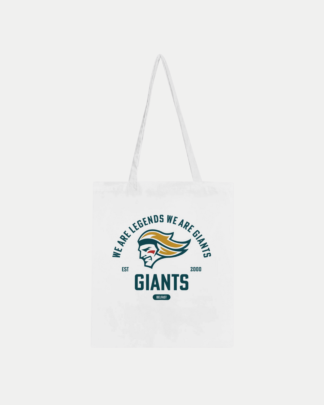 The Made To Order Giants Vintage Graphic Tote Bag White by Belfast Giants is a white 100% cotton tote featuring a stylized giant head logo and “We Are Legends We Are Giants, EST 2000, GIANTS Belfast” in blue and gold.