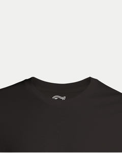 A close-up of the neckline of the Belfast Giants Made To Order Giants Vintage Style Graphic T-shirt in black, featuring a small white feather-like logo inside the collar against a plain white background.