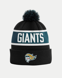 The Belfast Giants Noggin Beanie Black features a black and dark teal design, bold white GIANTS lettering, a pom-pom top, and a stylized Belfast Giants face logo with yellow and teal hair on the cuff.