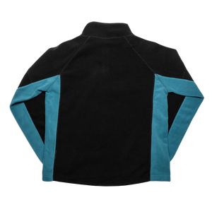 The Belfast Giants Fleece Half Zip Black features a black body, teal panels on the sleeves and sides, and a subtle Belfast Giants crest, shown here from the back with its streetwear-inspired long-sleeve design.