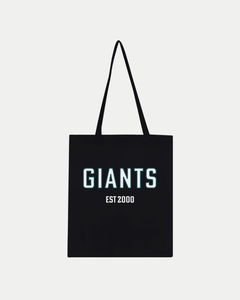 The Belfast Giants Made-To-Order Giants Est 2000 Classic Tote Bag in black features bold white “GIANTS” text with “EST 2000” below, centered on the front. Crafted from 100% cotton with two handles, it’s eco-conscious and shown on a plain white background.