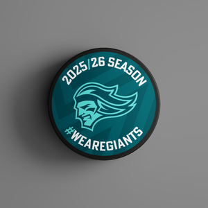 The Logo Season Puck Teal 25-26 from Belfast Giants Store by National Merchandise showcases a teal and white design with a giant head logo, 2025/26 SEASON at the top, and #WEAREGIANTS at the bottom on a teal background.