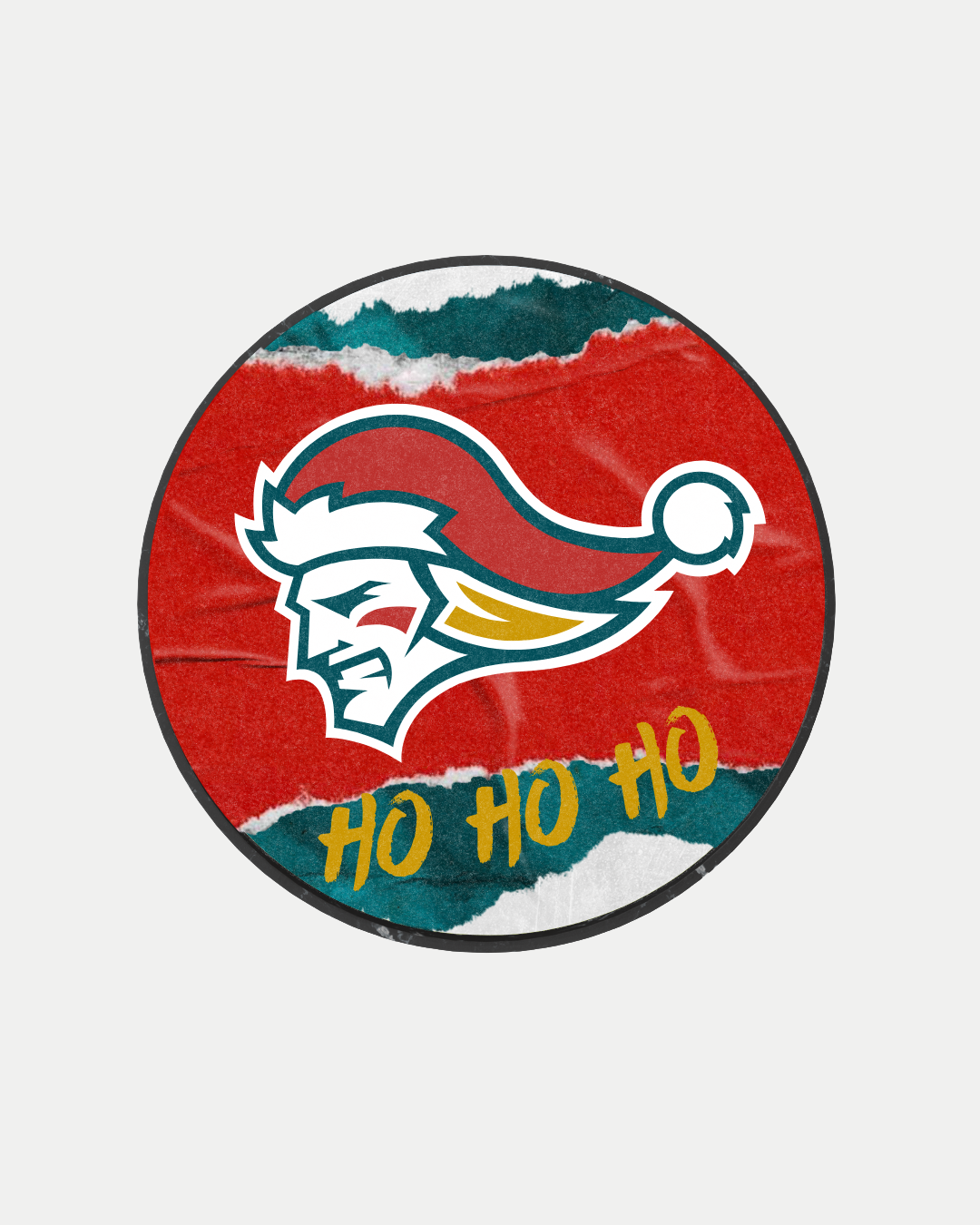 A circular graphic shows the Belfast Giants’ Santa Finn in profile wearing a Santa hat on a red, green, and white background, with "HO HO HO" in yellow below—celebrating the festive spirit of the Santa Finn Puck.