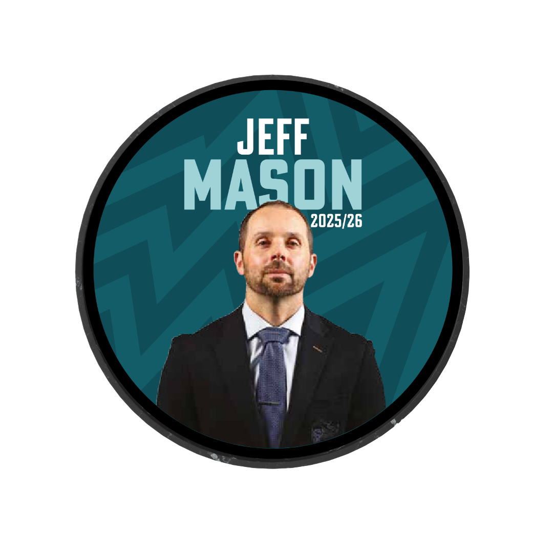 A man in a suit stands before a teal background with "JEFF MASON" and "2025/26" above him, celebrating the Belfast Giants' new 2025-26 Player Puck limited edition.