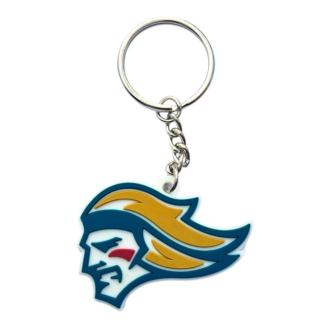 The Belfast Giants PVC Keyring features a stylized warrior head with gold hair, blue outline, and red cheek mark, attached to a metal ring. Available at the Belfast Giants Store by National Merchandise.