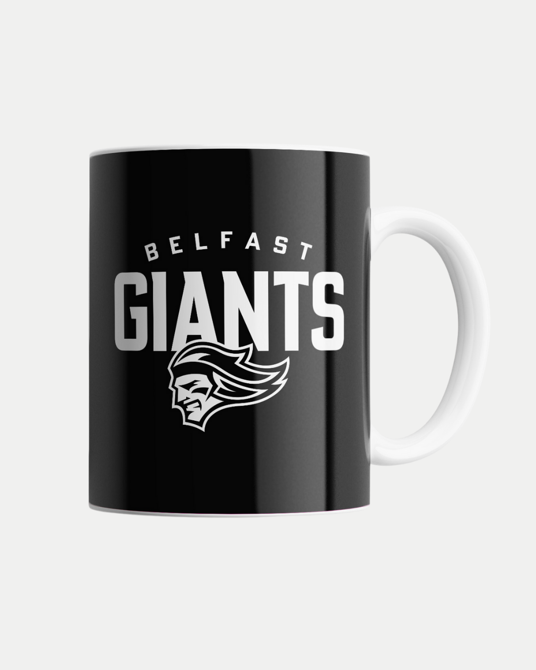 The Black Giants Logo Mug by Belfast Giants features a black design with white handle and the team's bearded helmet logo. Made to order to reduce waste; delivery details shown at checkout.