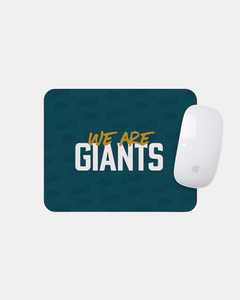 The We Are Giants Teal Mousemat by Belfast Giants features bold white and yellow lettering with a subtle GIANTS pattern and logo. Each mat is made-to-order to reduce waste. Delivery estimates are shown at checkout.