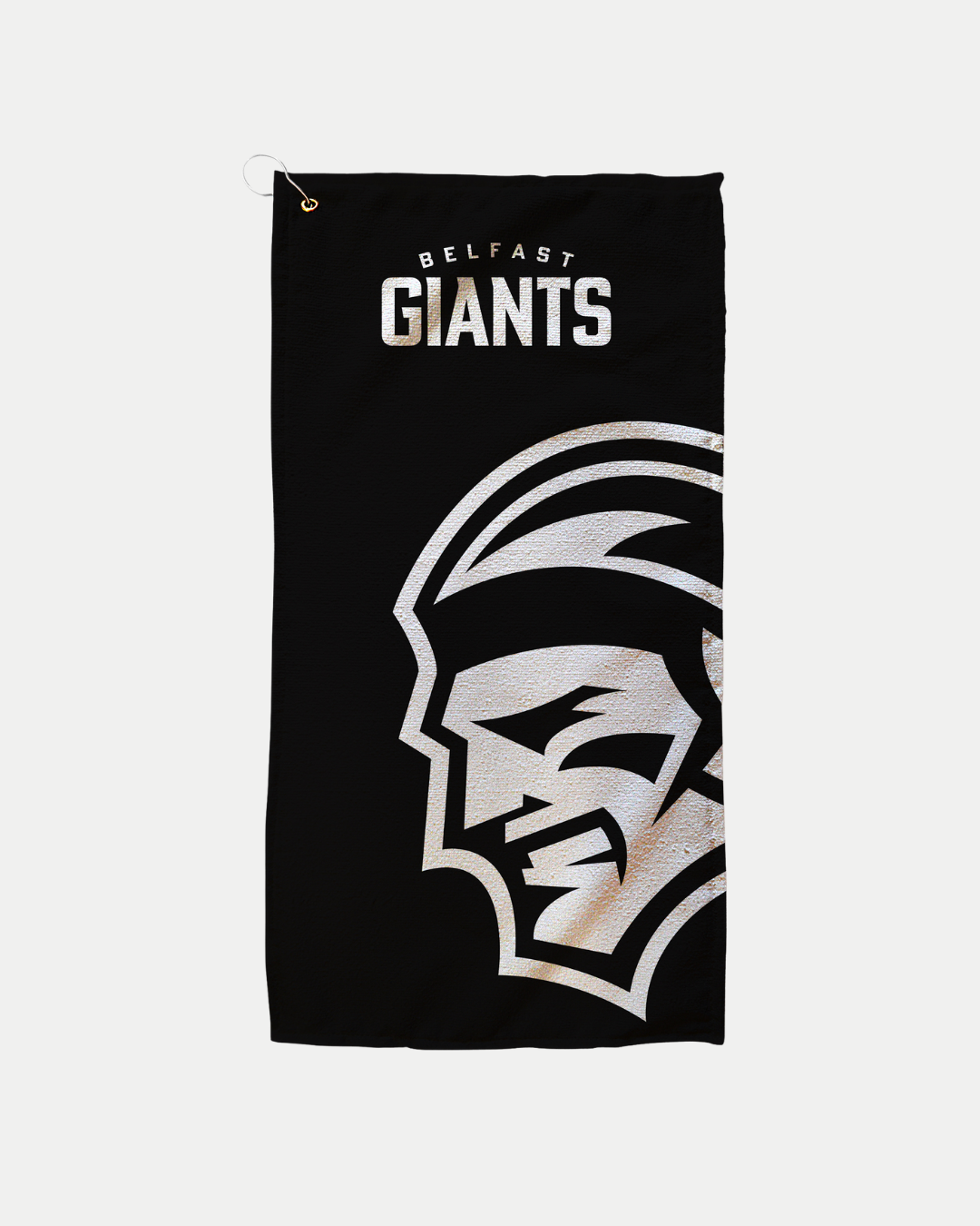 The Belfast Giants Logo Black Golf Towel features bold white team text and a large stylized warrior's face. Made-to-order by Belfast Giants to reduce waste, with delivery details shown at checkout.