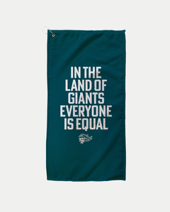 The In The Land Of Giants Golf Towel by Belfast Giants is a dark green, made-to-order towel with white "IN THE LAND OF GIANTS EVERYONE IS EQUAL" text and a small team logo. Made-to-order production helps reduce waste.