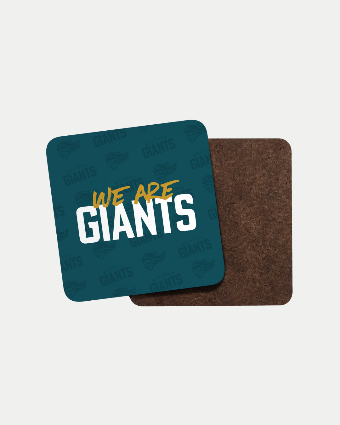 The We Are Giants Coaster by Belfast Giants features a blue top with bold "WE ARE GIANTS" text and a subtle repeating GIANTS logo pattern. Made-to-order to reduce waste, with another plain brown coaster partially visible behind it.