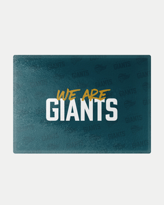 The We are Giants Teal Chopping Board by Belfast Giants features "WE ARE" in gold script above bold white "GIANTS," set against a dark teal background with subtle repeated GIANTS text and logos, crafted to order.