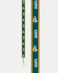The Belfast Giants Core Teal/Gold Lanyard by Belfast Giants features teal, gold, and white stripes, bold “GIANTS” text, a stylized tiger head logo, “CEBU CITY” vertically, and a durable metal clip for easy attachment.