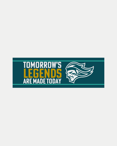 The Belfast Giants' Tomorrow's Legends Sticker measures 240mm by 80mm in teal and white, displaying "TOMORROW'S LEGENDS ARE MADE TODAY" next to a stylized knight’s face.