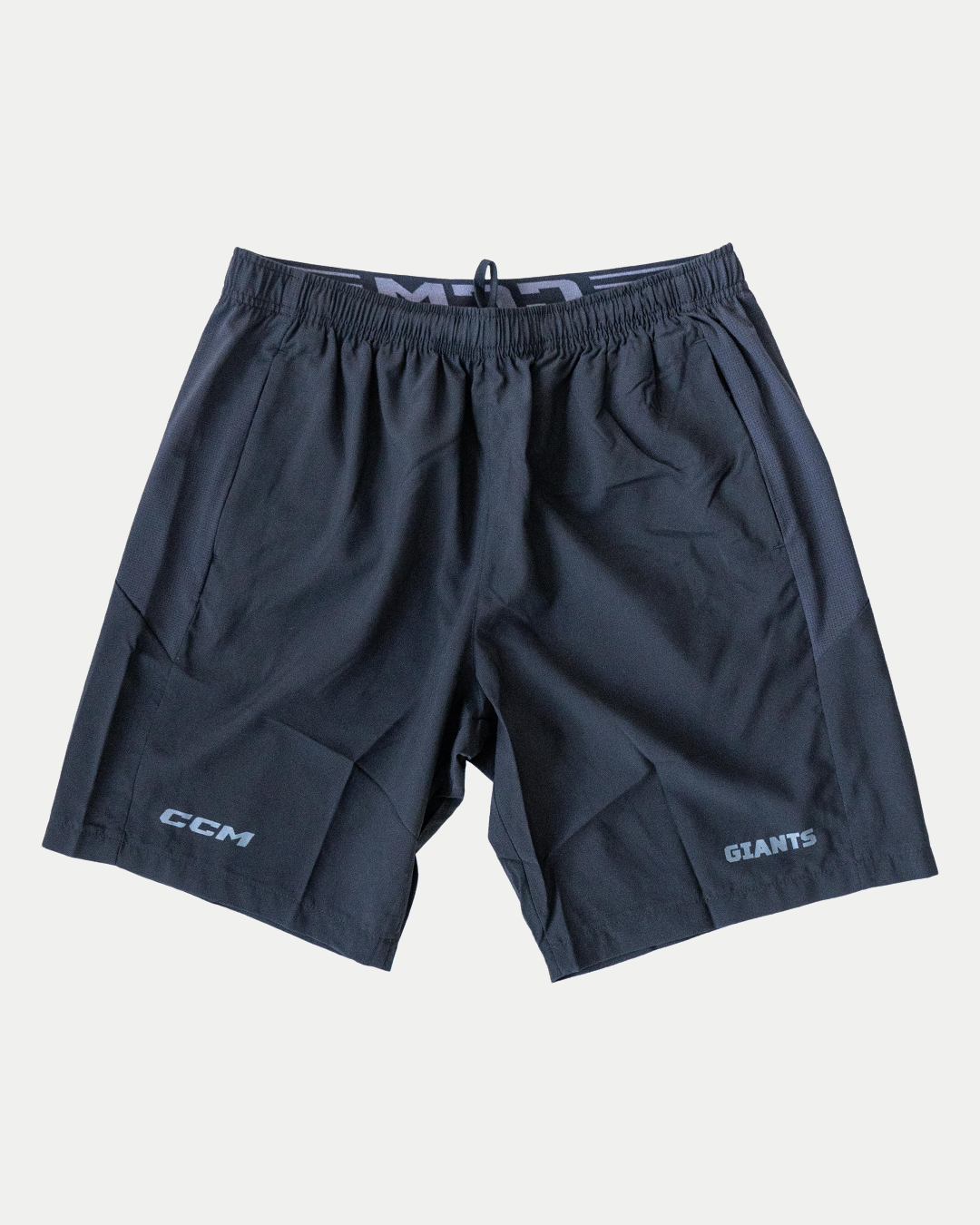 The Belfast Giants CCM Training Shorts are black athletic shorts featuring the CCM and Belfast Giants logos near the bottom of each leg, shown on a plain white background.