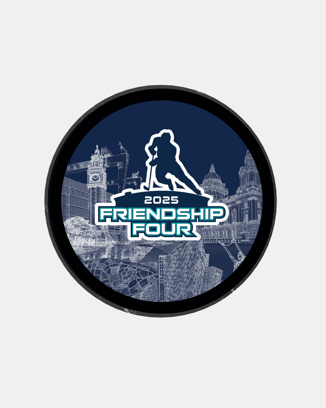 The CLICK & COLLECT Friendship Four 2025 Logo Puck from Belfast Giants Store by National Merchandise features the 2025 logo with a player silhouette and Belfast landmarks in white on dark blue—a memorable SSE Arena Belfast keepsake.