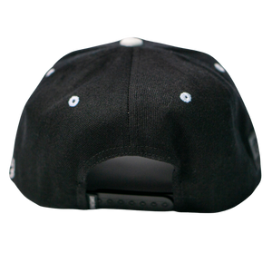 A close-up of the Belfast Giants Cap Black and White by Belfast Giants, featuring white eyelets and an adjustable snapback closure—a must-have for true supporters.