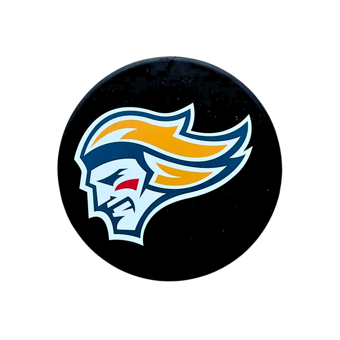 The Belfast Giants Puck Bottle Opener by Belfast Giants Store features a black puck with a stylized fierce-faced figure with yellow and orange hair, outlined in white and blue, set against a plain white background.