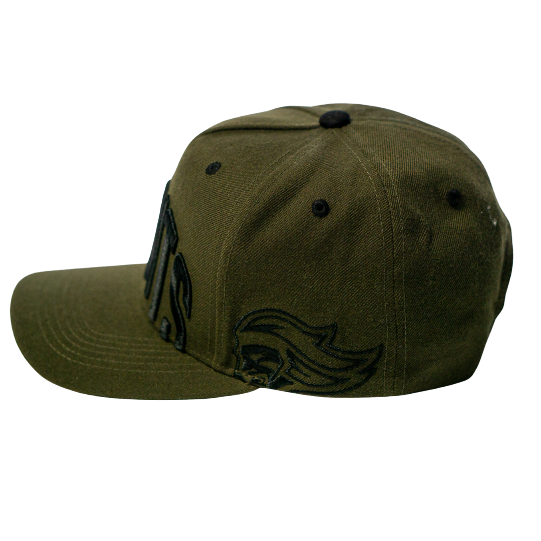 The Belfast Giants Cap Olive by Belfast Giants is shown from the left side, displaying bold front lettering and a stylized side graphic—an ideal game day accessory set against a plain background.