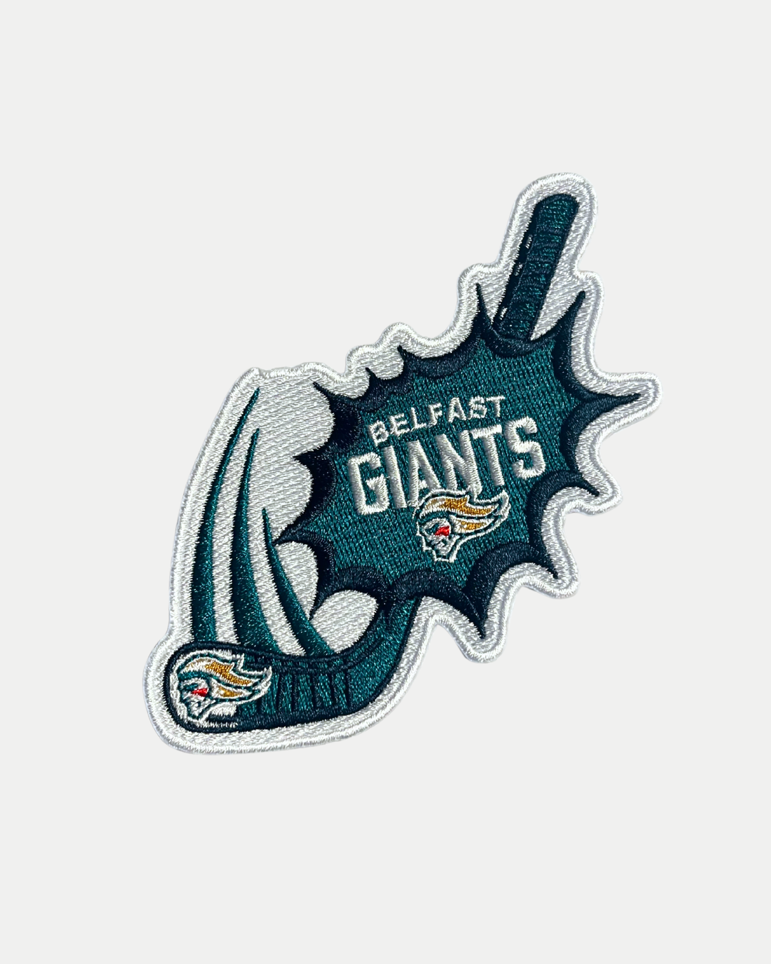 The Belfast Giants Patch 25/26 from Belfast Giants Store by National Merchandise features the team logo with a teal hockey stick, puck, and two crests, plus “Belfast Giants” in bold lettering.