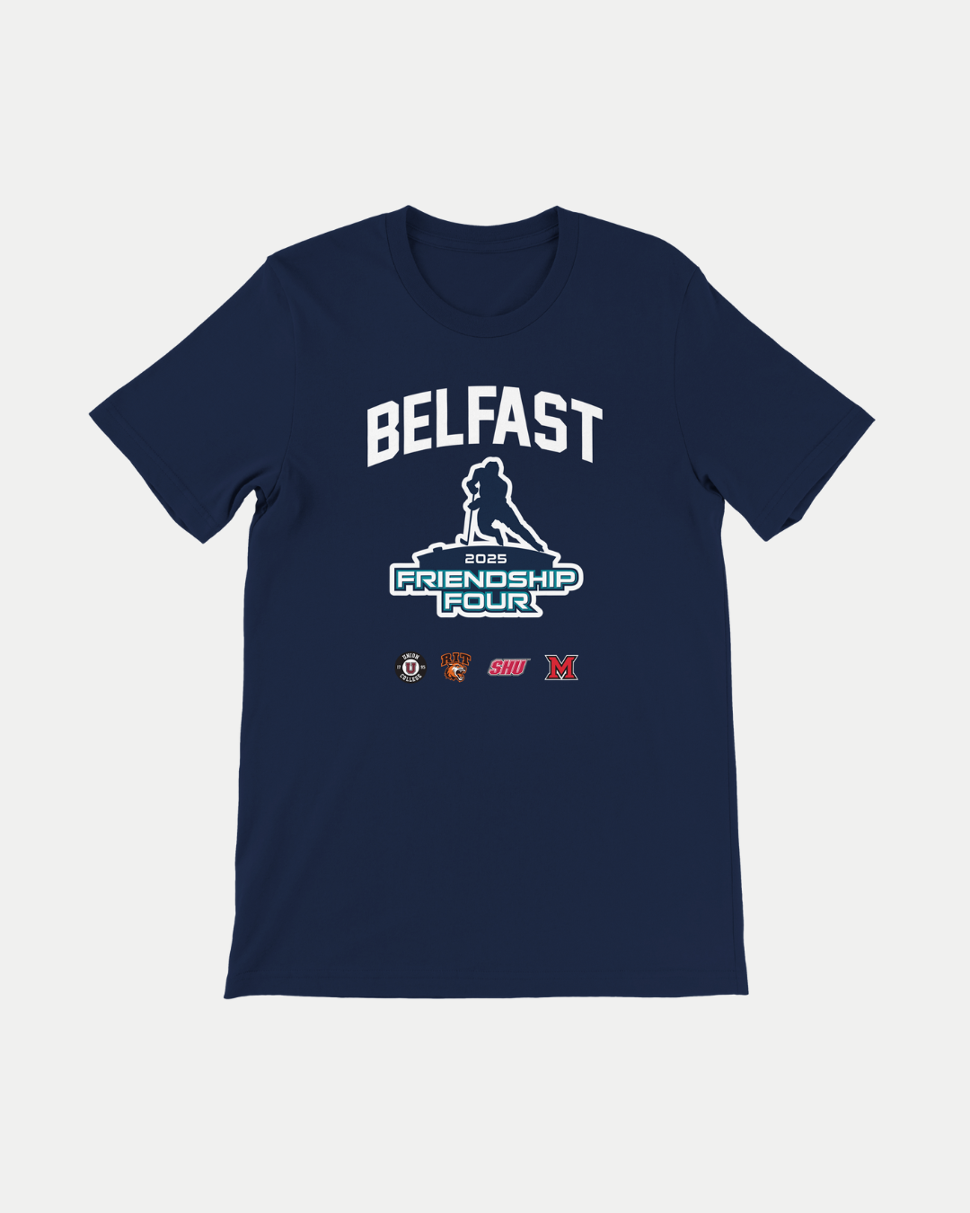 The MADE-TO-ORDER Friendship Four 2025 T-Shirt by Belfast Giants features "BELFAST" and the event graphic with four college hockey logos on navy Airlume cotton, offering a soft feel and unisex tailored fit.