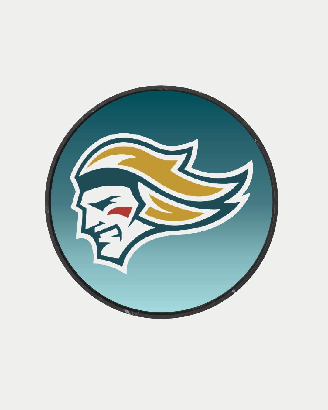 The Belfast Giants Colour Logo Puck 25-26 from Belfast Giants Store by National Merchandise features a circular logo with a stylized profile, flowing yellow hair, white outlined face, and red streak on teal gradient.