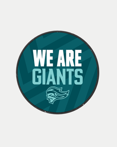 The We Are Giants Teal Logo Puck 25-26 from Belfast Giants Store by National Merchandise features a circular teal emblem with bold white and light teal "WE ARE GIANTS" text and a stylized giants head logo at the bottom.