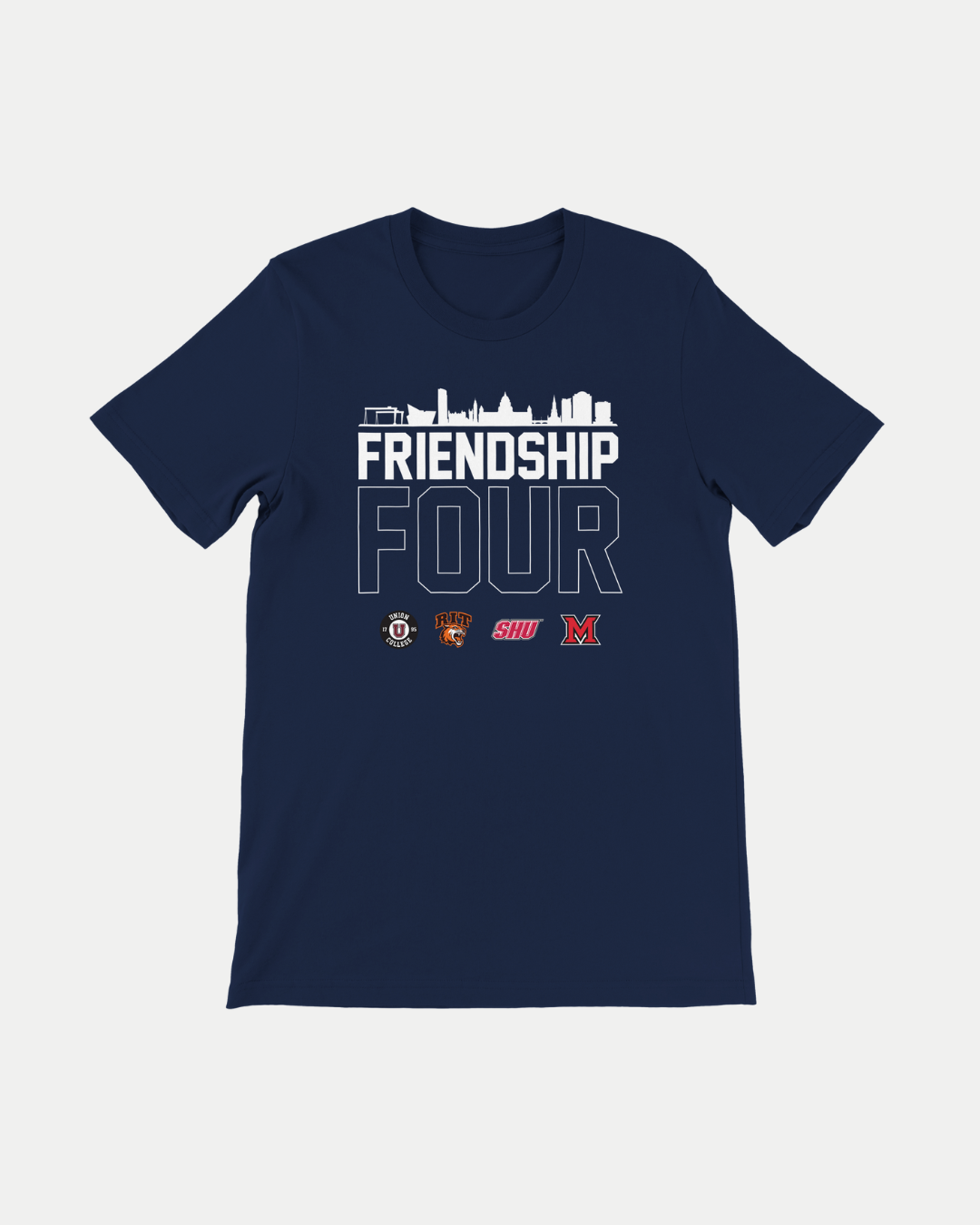The Belfast Giants MADE-TO-ORDER Friendship Four 2025 Team Logos Graphic T-Shirt features a navy blue design with a white city skyline, FRIENDSHIP FOUR text, four college hockey team logos, and a unisex tailored fit in soft Airlume cotton.