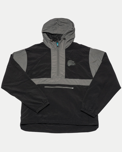 The Belfast Giants Anorak Black is a half-zip pullover with a zippered horizontal pocket and the Giants logo on the left chest, ideal for cold weather, shown flat on a light background.