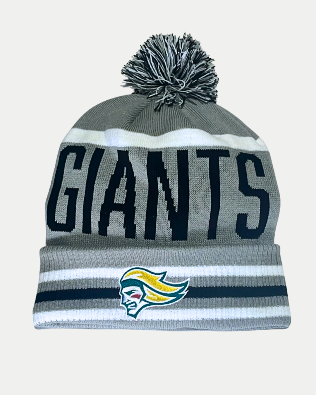 The 25-26 CCM Grey Pom Beanie from Belfast Giants Store by National Merchandise features black and white stripes, a pom-pom, "GIANTS" in bold black letters, and a stylized face logo on the front cuff.