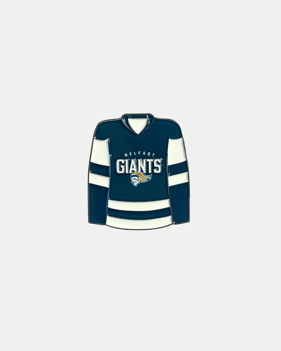 The Belfast Giants Pin Badge Shirt 25/26 from Belfast Giants Store by National Merchandise is a dark teal hockey jersey pin with white sleeve stripes, "Belfast Giants" on the front, and the team’s mascot logo below.