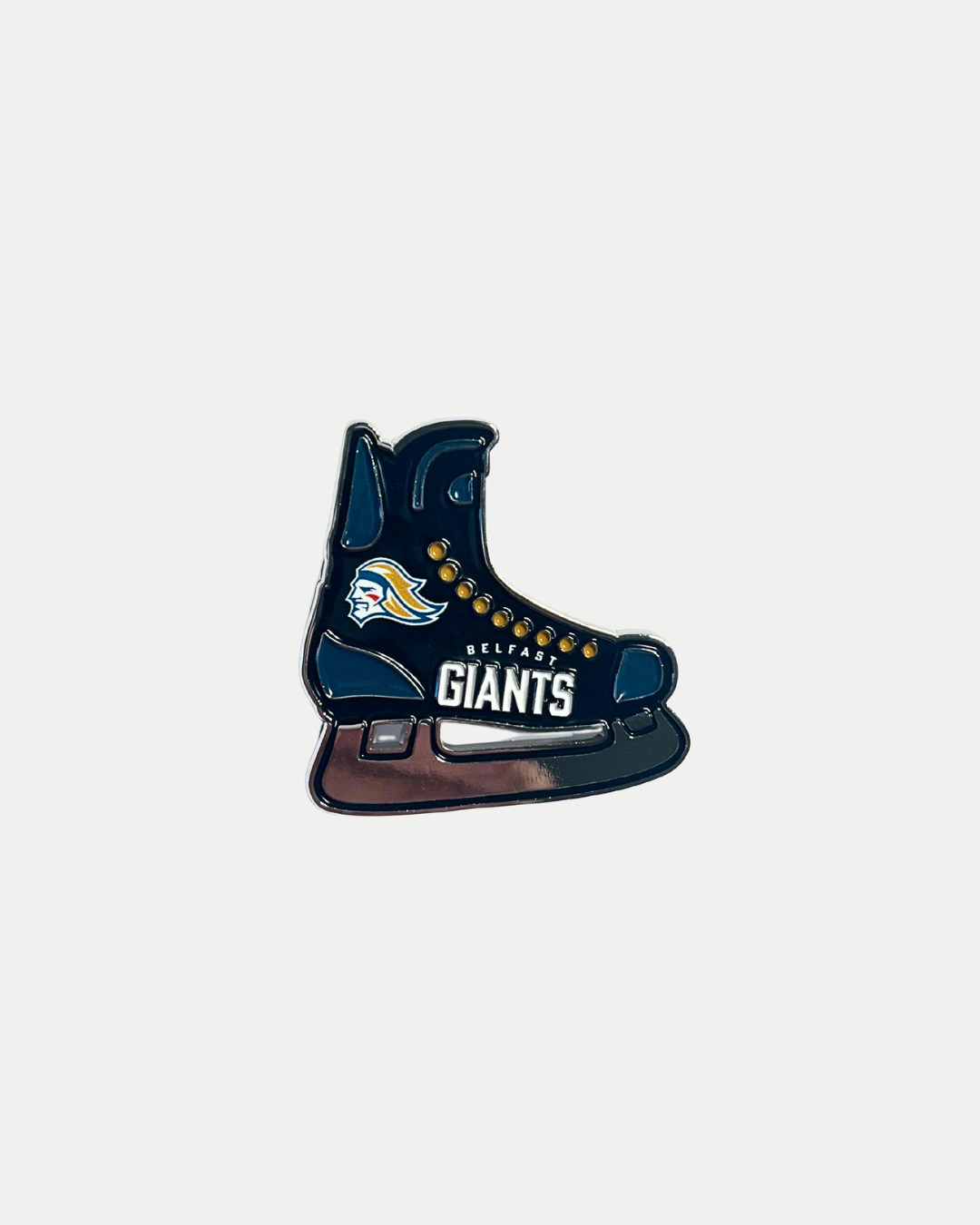 The Belfast Giants Pin Badge Boot 25/26 from Belfast Giants Store by National Merchandise features a black ice skate design with the team logo and “Belfast Giants” text, displayed on a plain white background.