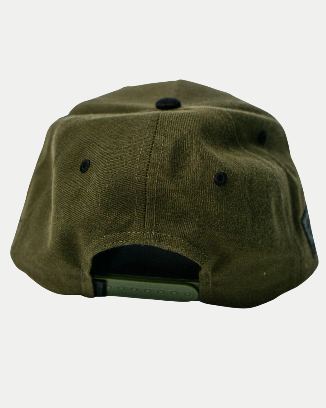 The Belfast Giants Cap Olive by Belfast Giants features a plastic adjustable snap closure and black embroidered eyelets at the back—perfect for game day.