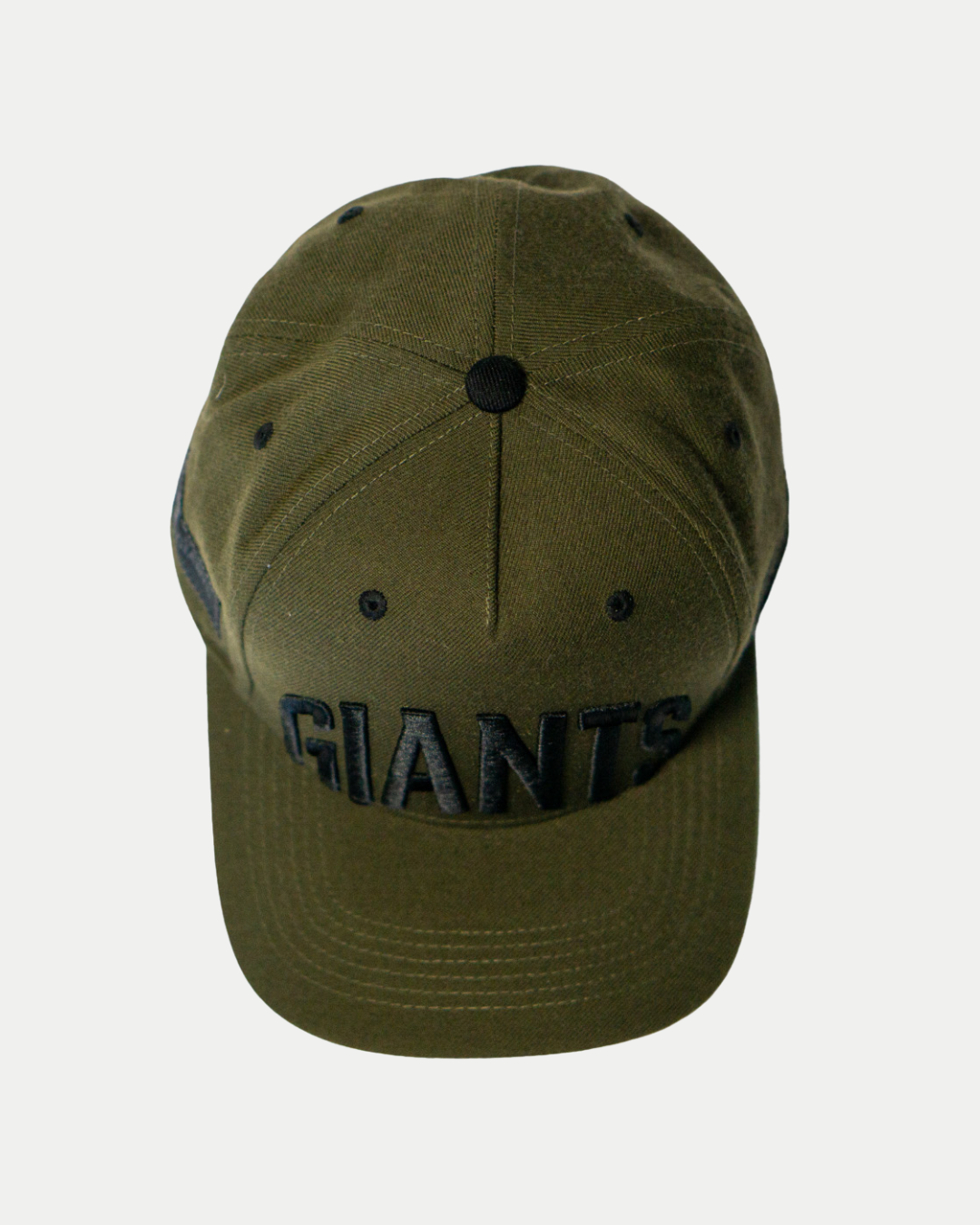 The Belfast Giants Cap Olive features "GIANTS" embroidered in black on the front. This stylish Belfast Giants cap is shown from a top-down angle against a plain white background—ideal for game day.