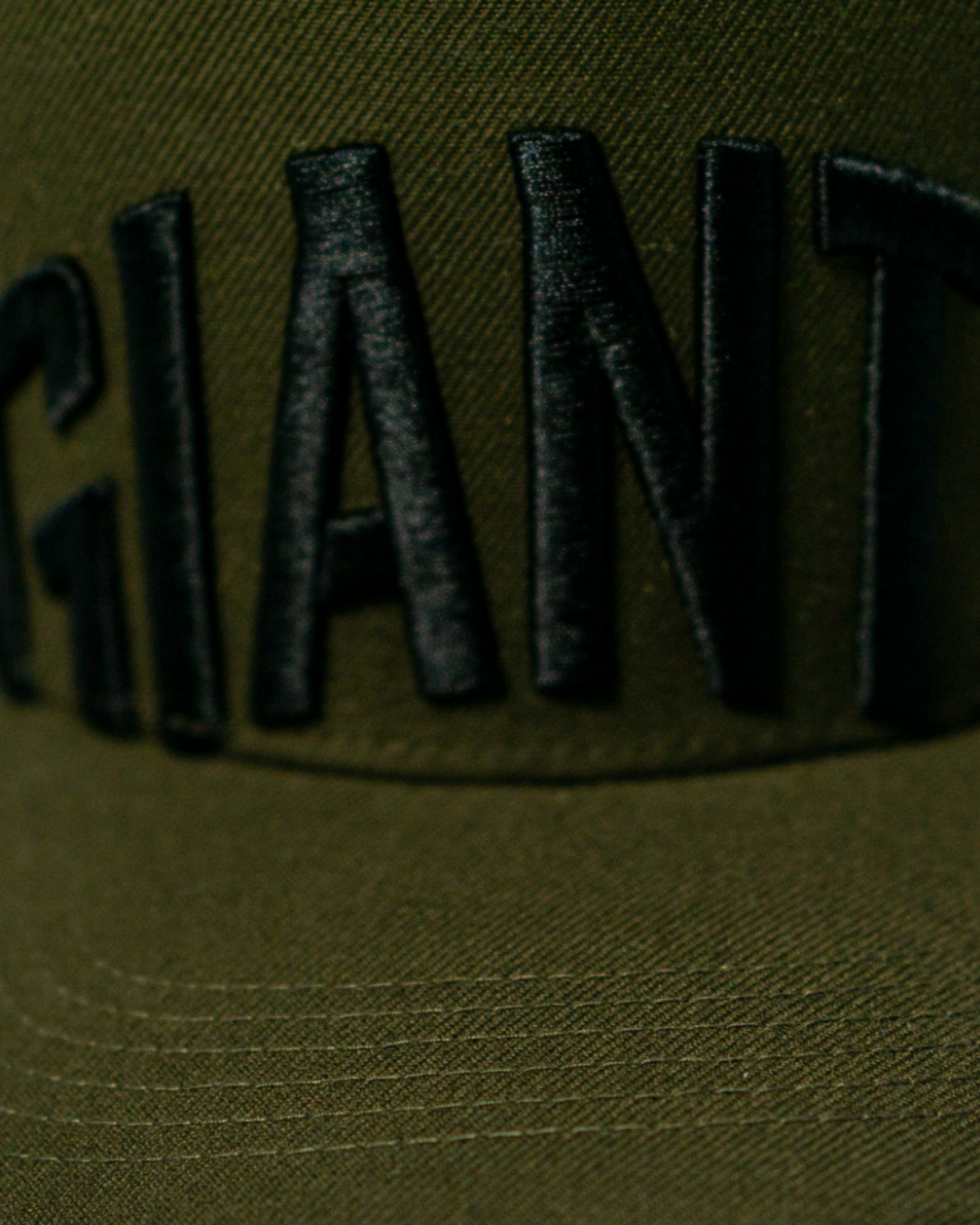 A close-up of the Belfast Giants Cap Olive by Belfast Giants, perfect for game day.