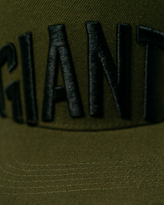 A close-up of the Belfast Giants Cap Olive by Belfast Giants, perfect for game day.