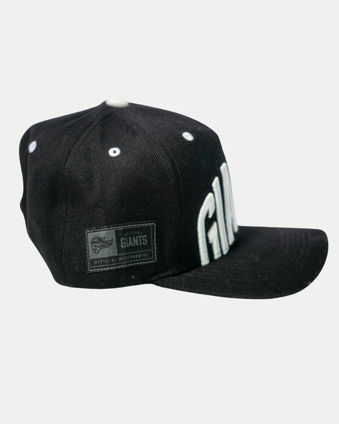 The Belfast Giants Cap Black and White by Belfast Giants features a flat brim and bold white "GIANTS" embroidery on the front, plus an official side patch—a must-have for true fans.