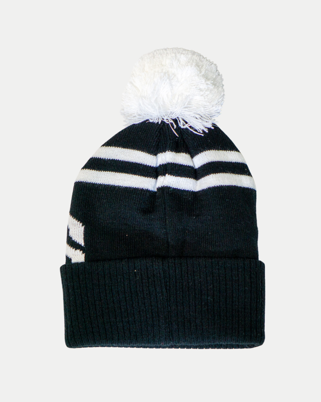 The Belfast Giants Beanie Black and White by Belfast Giants features two white horizontal stripes, a folded brim, and a large white pom-pom on top, shown against a plain light background.