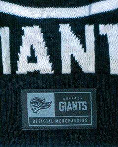 A close-up of the Belfast Giants Beanie Black and White shows a stitched label with the Belfast Giants logo and "Official Merchandise," making this stylish hat ideal for fans.