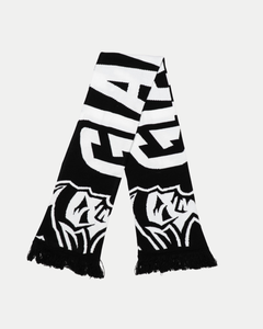 The Belfast Giants Scarf Black and White by Belfast Giants features bold, abstract lettering, graphic illustrations, team logo, and fringe on both ends, shown on a white background.