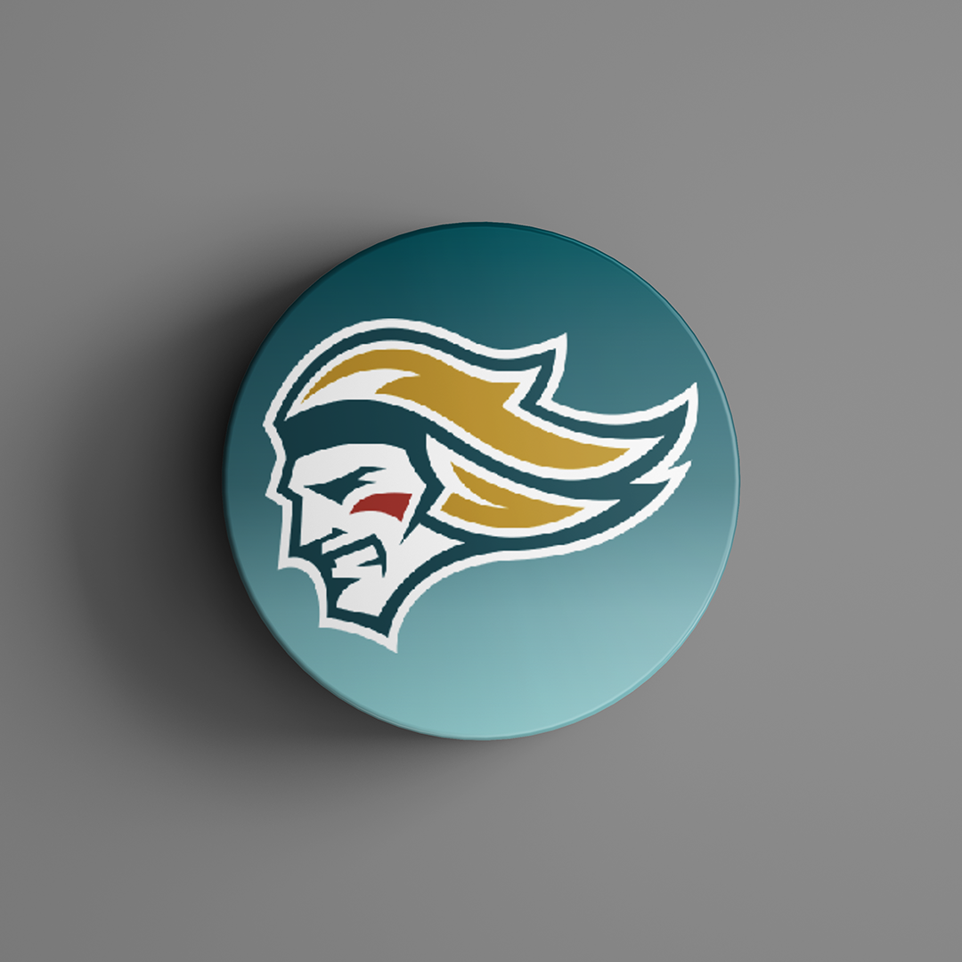The Belfast Giants Colour Logo Puck 25-26 from Belfast Giants Store by National Merchandise features a round design with a stylized knight’s head, flowing yellow hair, red cheek mark, and teal gradient background.