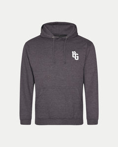 The BG Logo Grey Hoodie by Belfast Giants is a dark gray sweatshirt with a front pocket, drawstrings, and a white BG logo on the left chest. Shown on a plain white background, it's ideal for everyday casual wear.